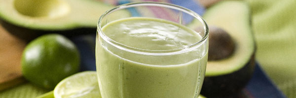 Avocado pineapple smoothie in glass