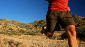 Jogger running on trail